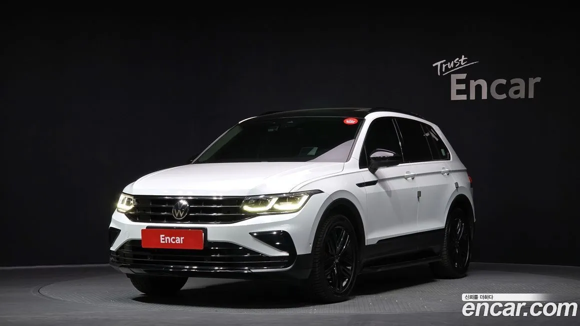 Volkswagen Tiguan — фото 1