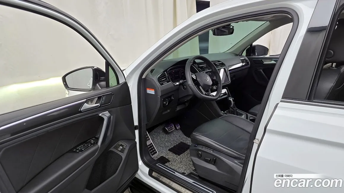 Volkswagen Tiguan — фото 9