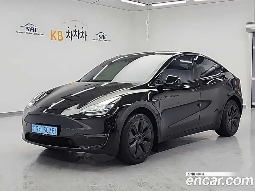 Tesla Model Y — фото 1