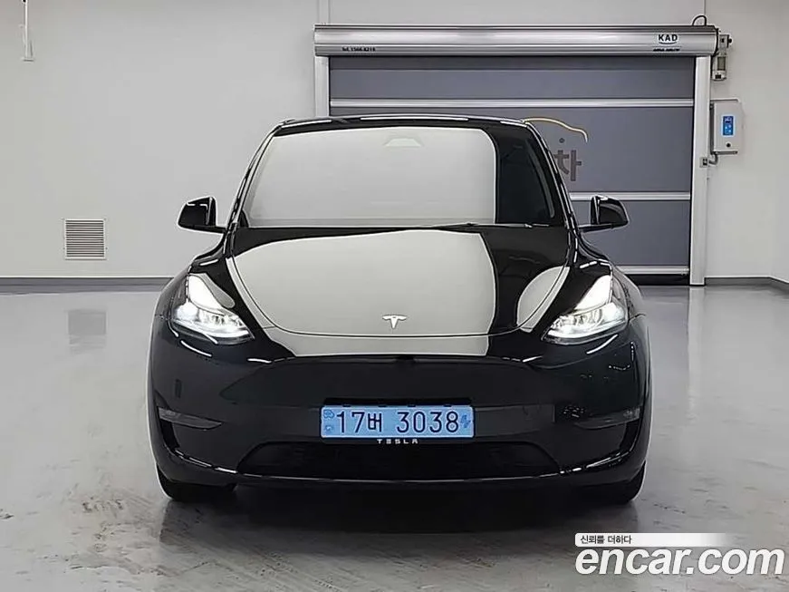 Tesla Model Y — фото 7