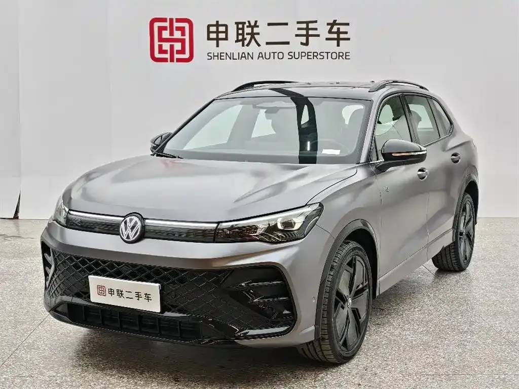 Volkswagen Tiguan L — фото 1