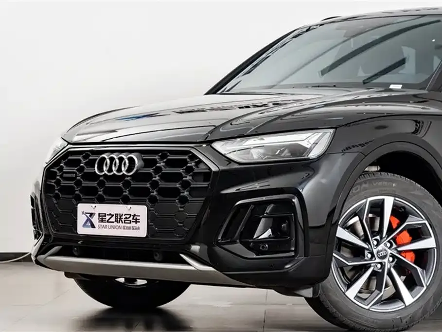 Audi Q5L — фото 5