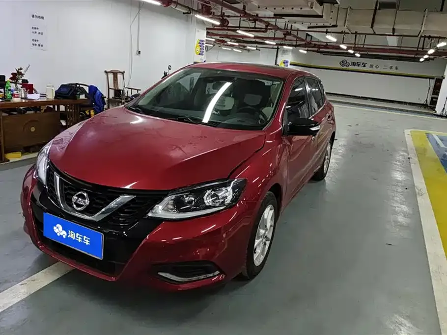 Nissan Tiida — фото 1