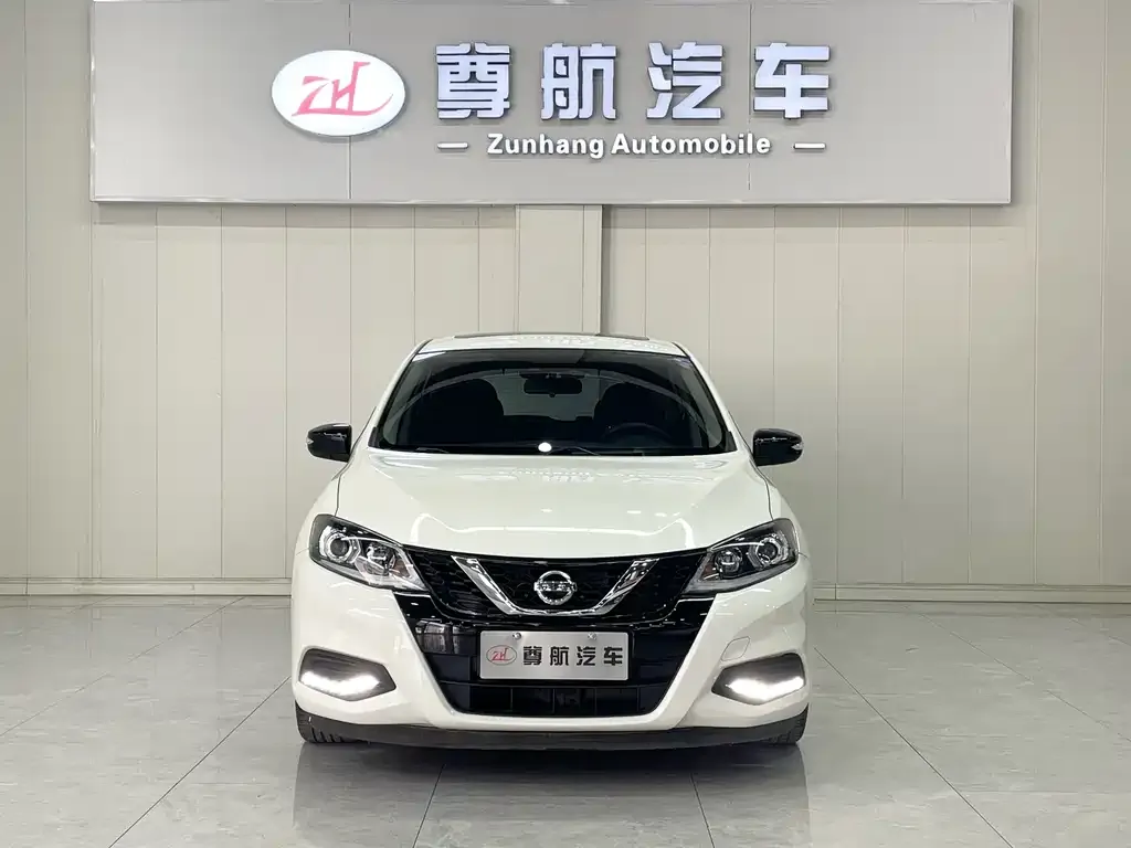 Nissan Tiida — фото 3