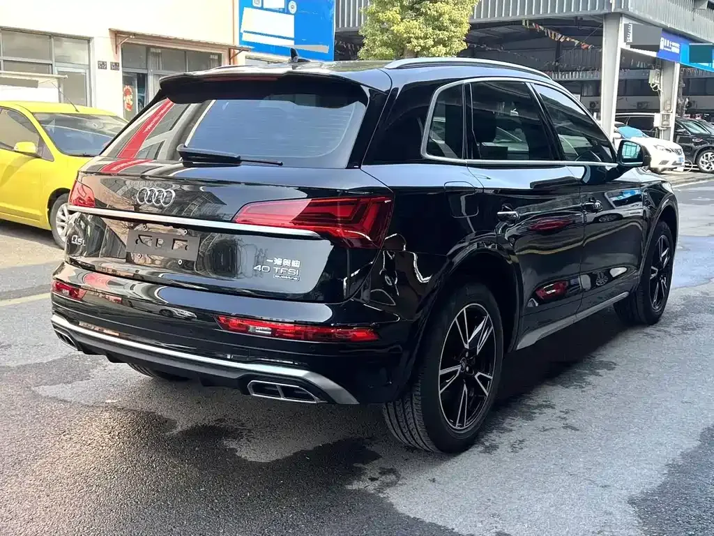 Audi Q5L — фото 6