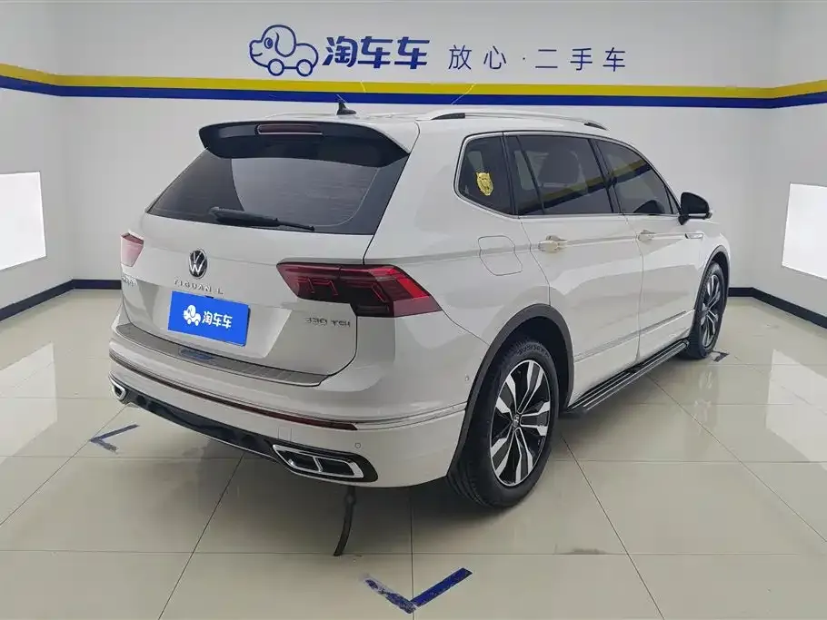 Volkswagen Tiguan L — фото 5