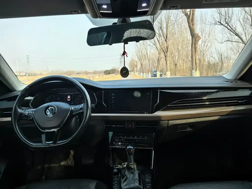 Volkswagen Passat New Energy — фото 3