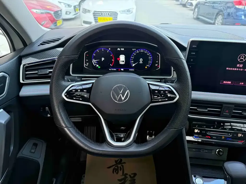 Volkswagen Tiguan L — фото 2