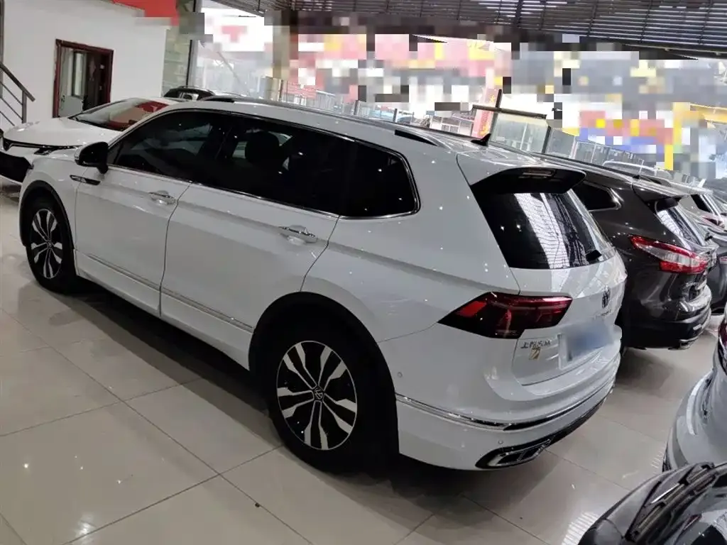 Volkswagen Tiguan L — фото 4