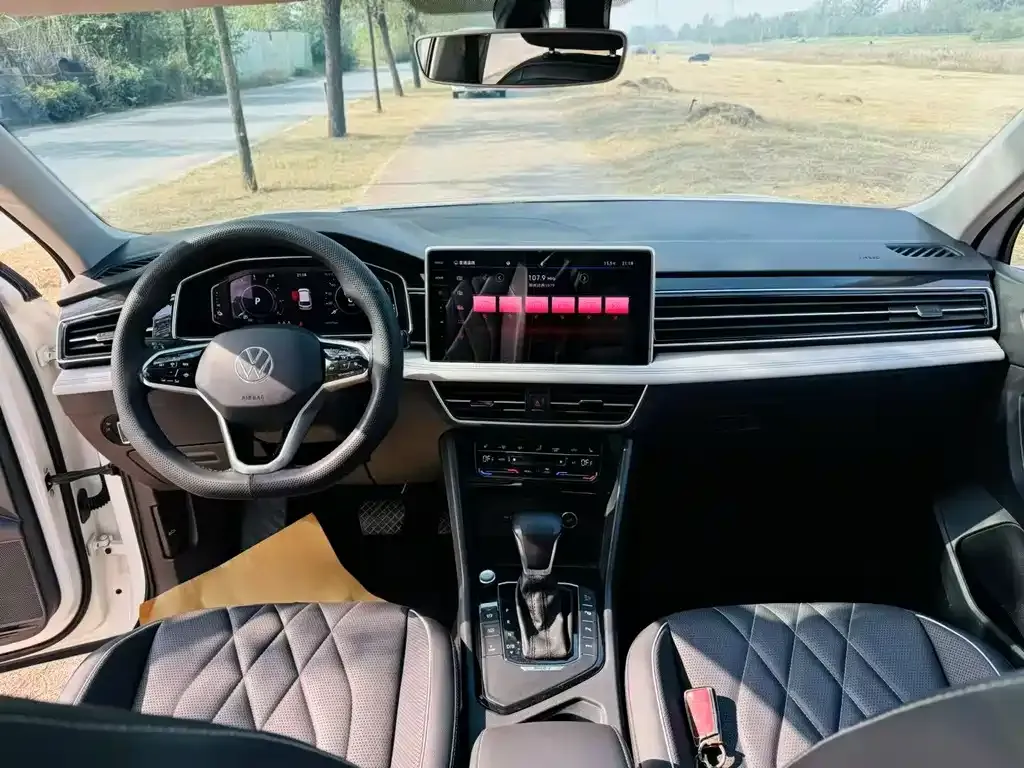 Volkswagen Tiguan L New Energy — фото 3