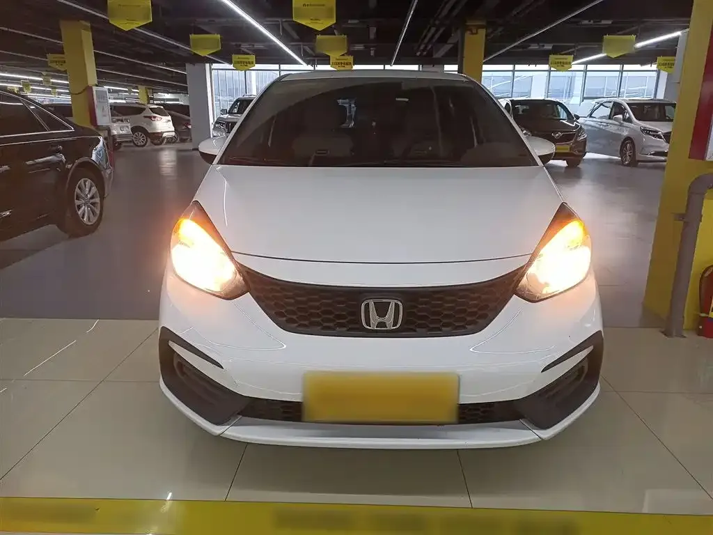 Honda Fit — фото 8