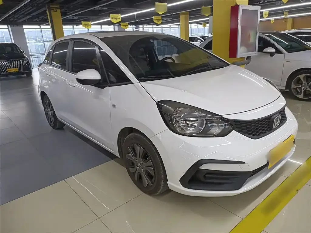 Honda Fit — фото 10