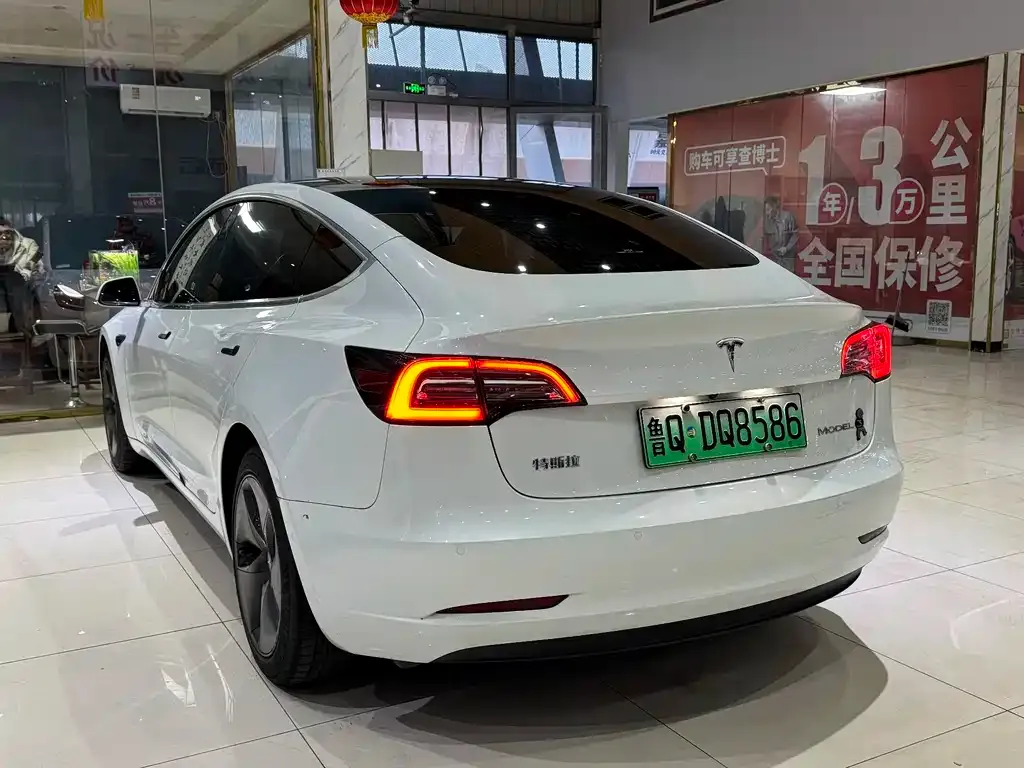 Tesla Model 3 — фото 10