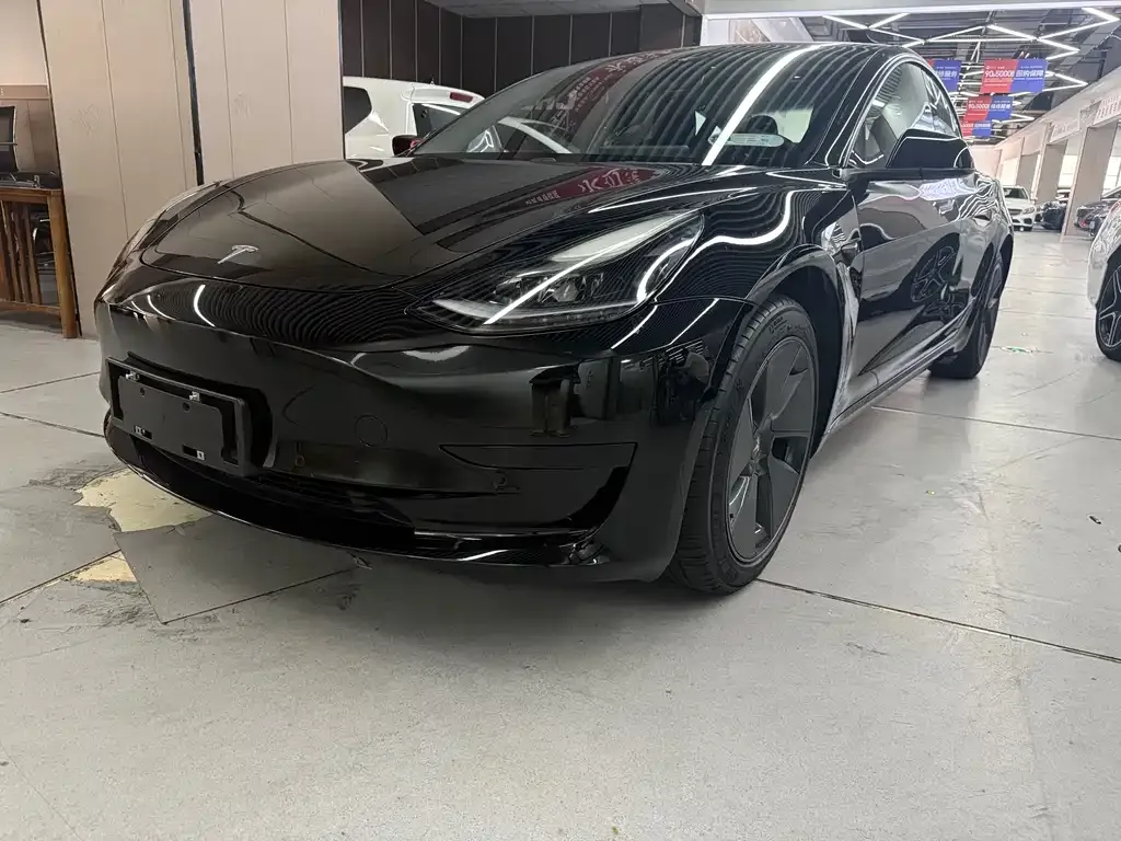 Tesla Model 3 — фото 10