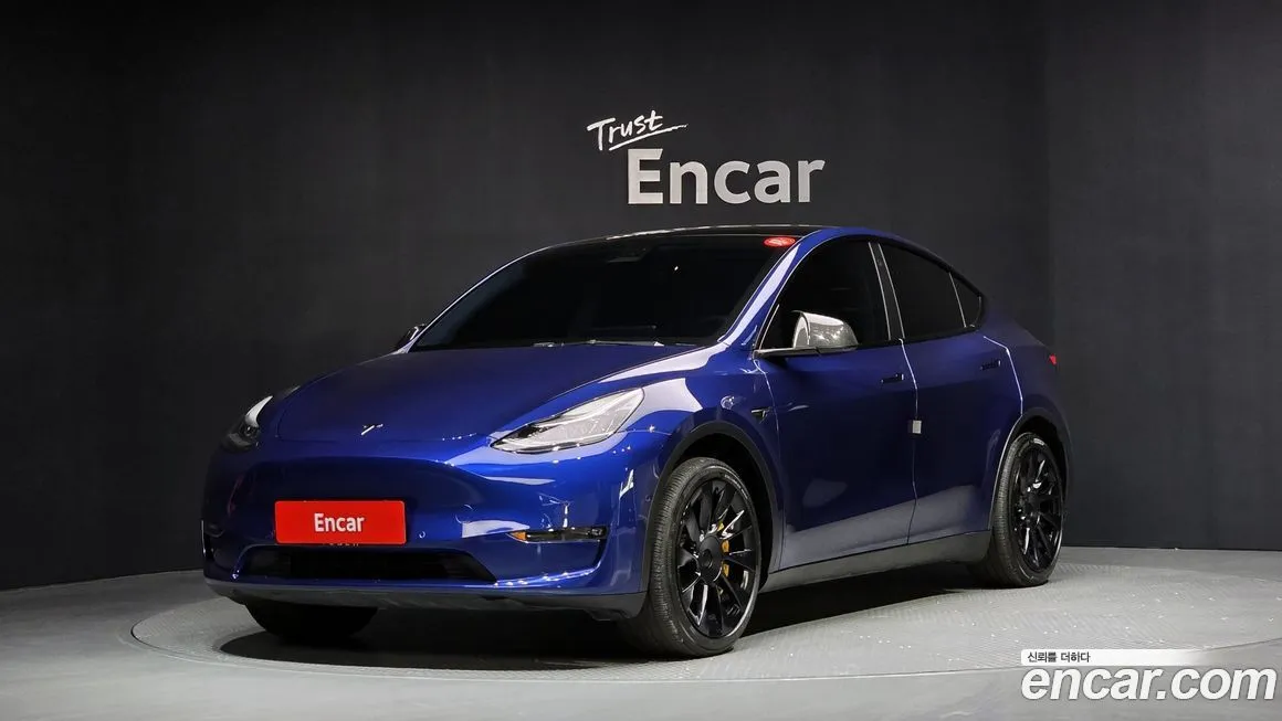 Tesla Model Y — фото 1