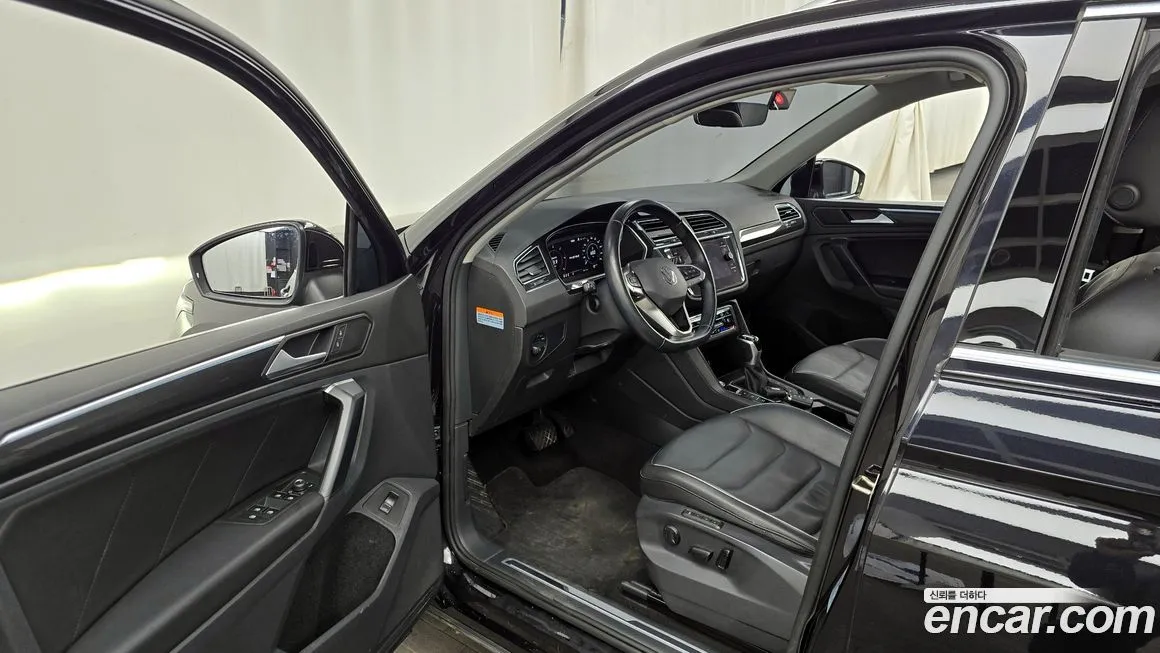 Volkswagen Tiguan — фото 10