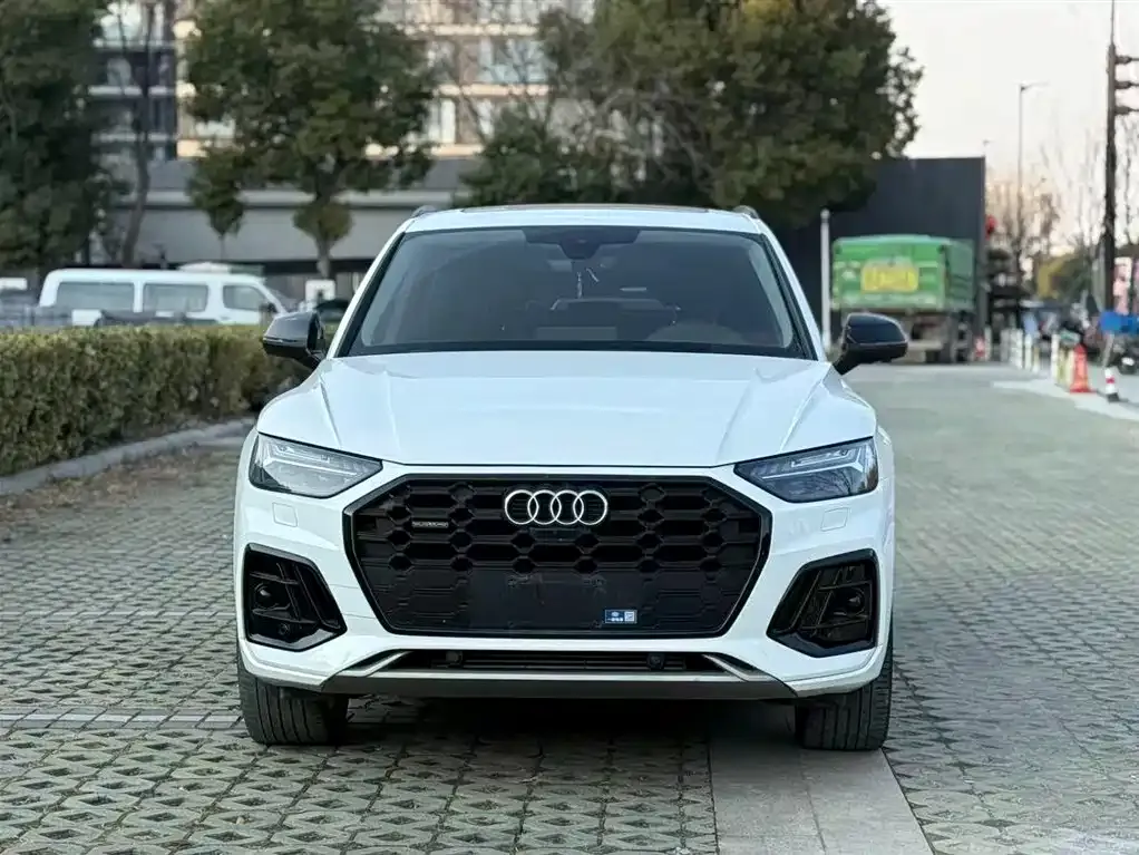 Audi Q5L — фото 5