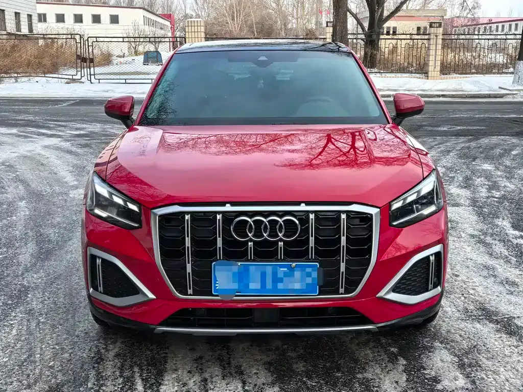 Audi Q2L — фото 9
