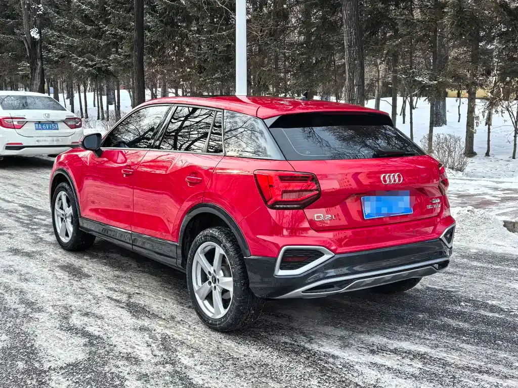 Audi Q2L — фото 7