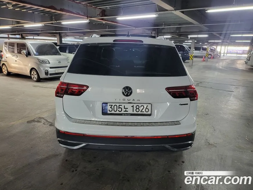 Volkswagen Tiguan — фото 8