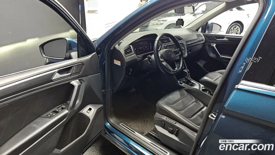 Volkswagen Tiguan — фото 10