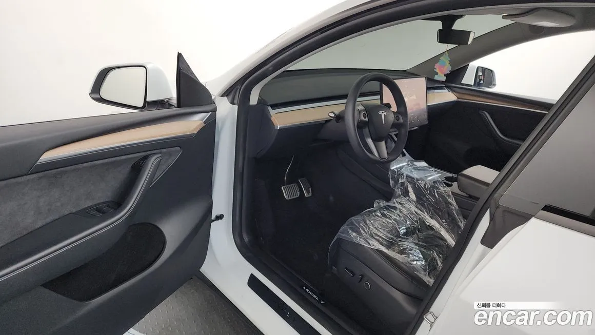 Tesla Model Y — фото 9