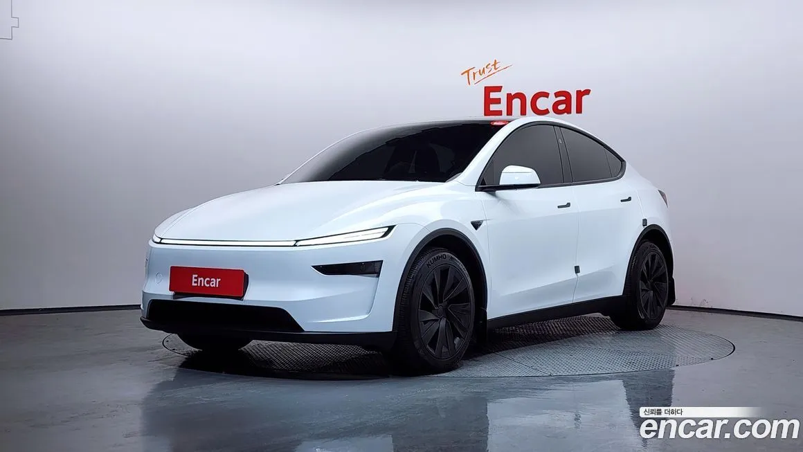 Tesla Model Y — фото 1