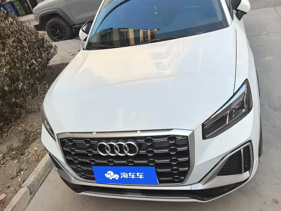 Audi Q2L — фото 7