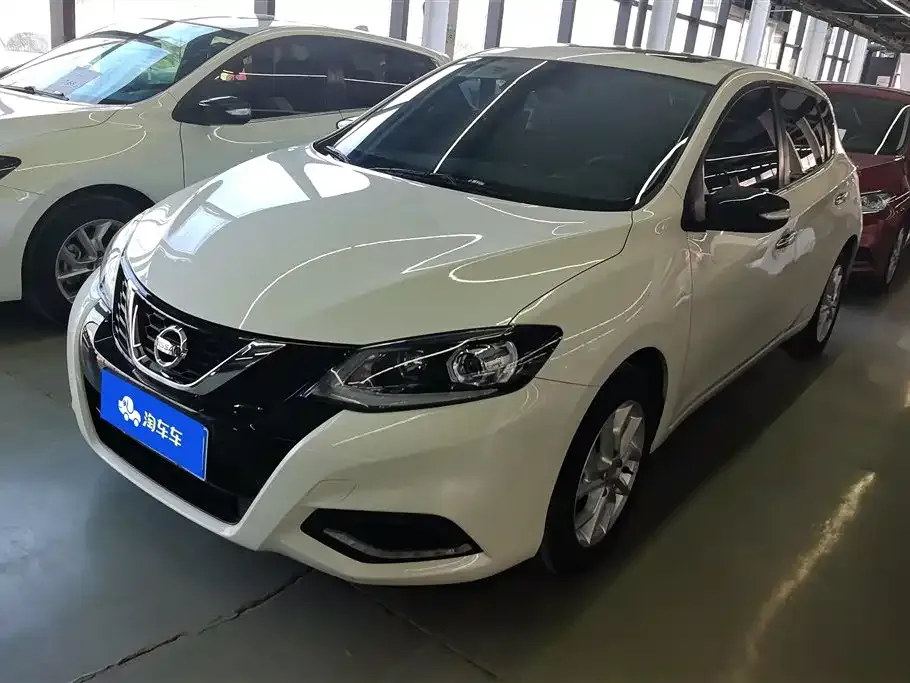Nissan Tiida — фото 1