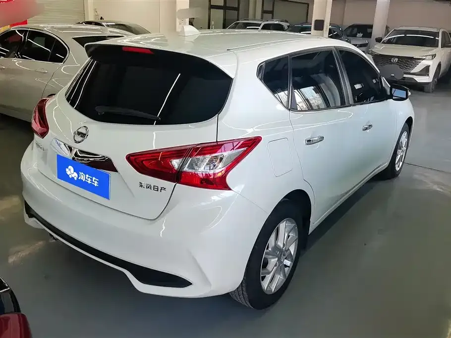 Nissan Tiida — фото 5