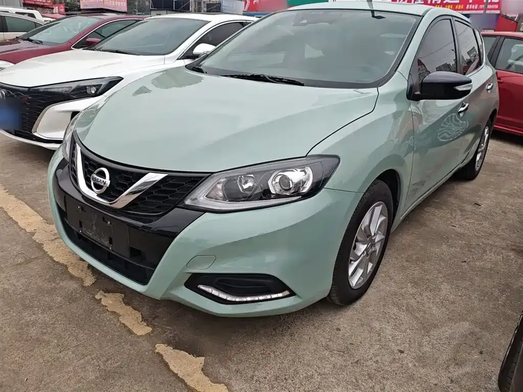 Nissan Tiida — фото 10