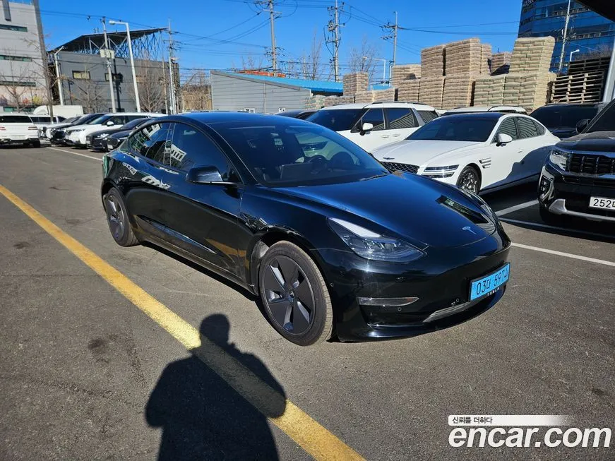 Tesla Model 3 — фото 10