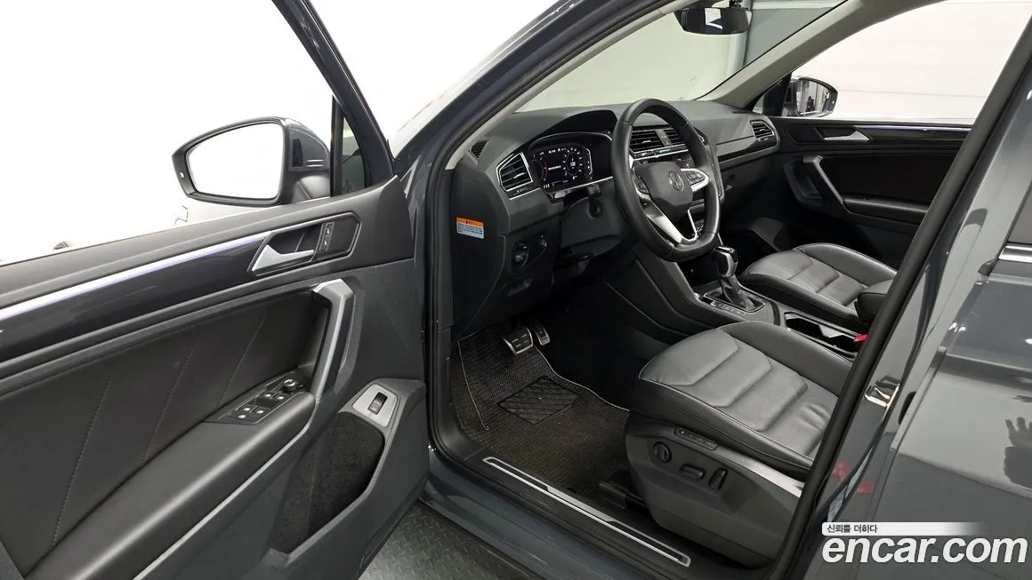 Volkswagen Tiguan — фото 10