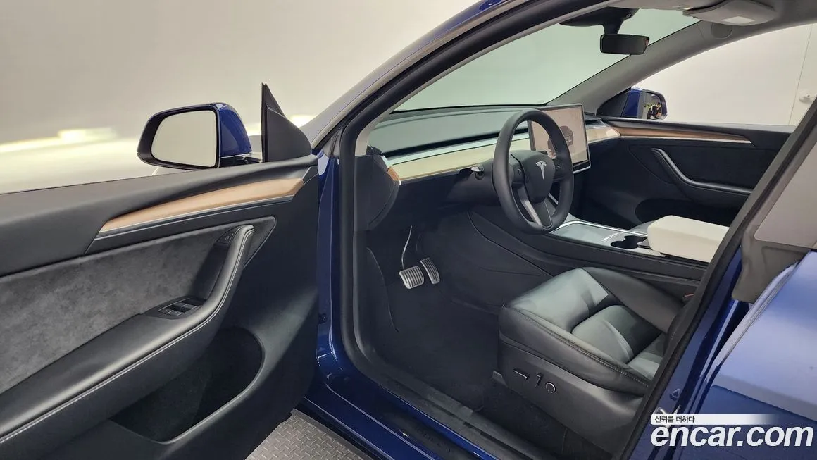 Tesla Model Y — фото 9