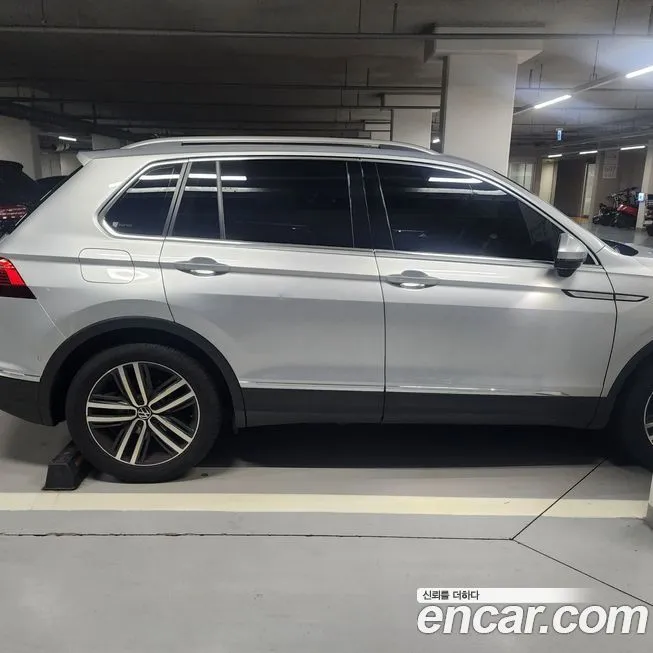 Volkswagen Tiguan — фото 1
