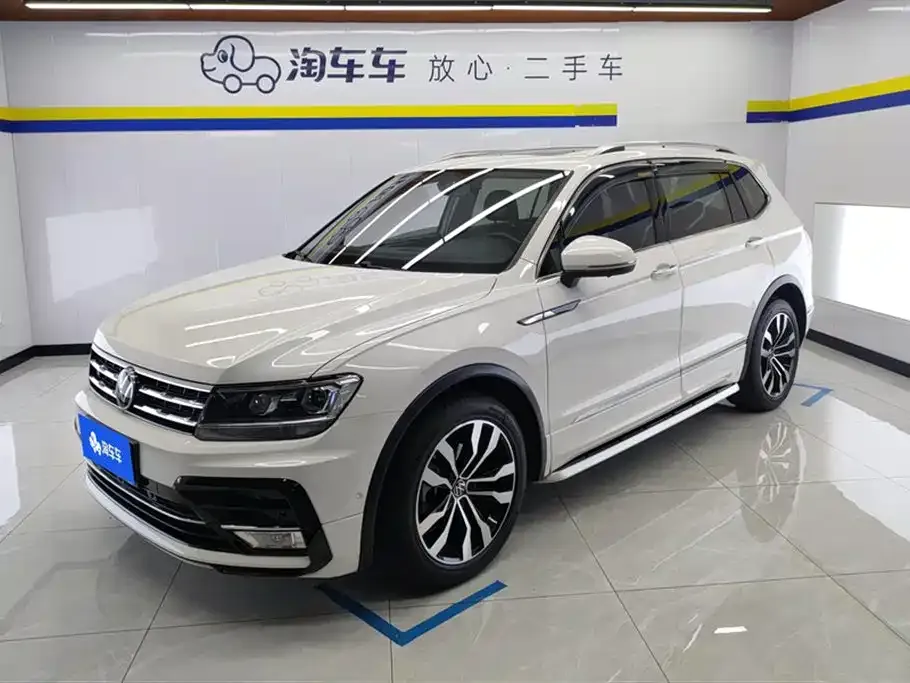 Volkswagen Tiguan L — фото 1