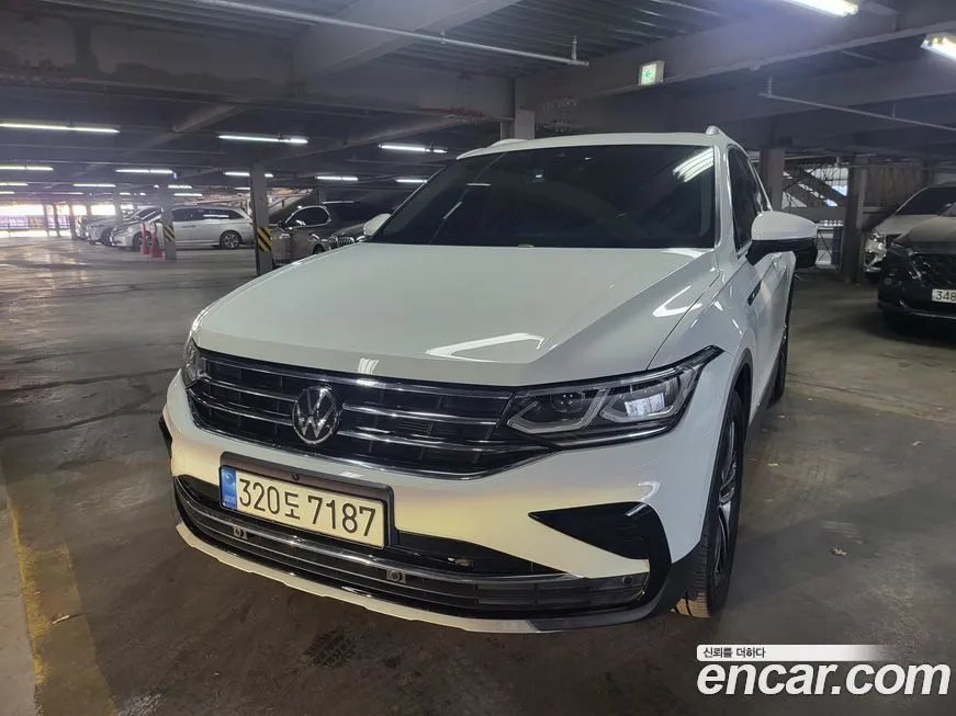 Volkswagen Tiguan — фото 1
