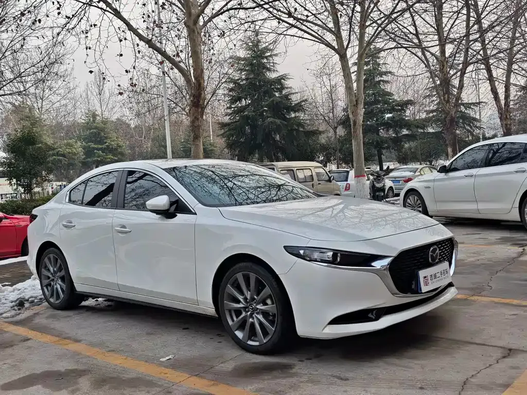 Mazda 3 Axela — фото 10