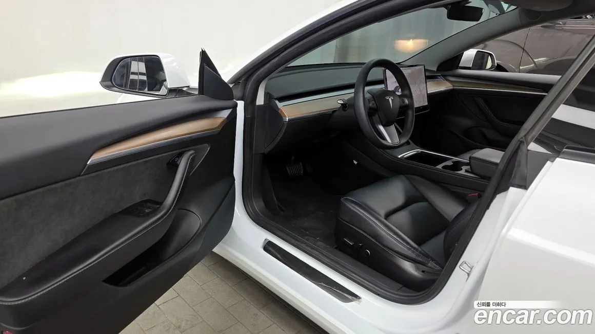 Tesla Model 3 — фото 9