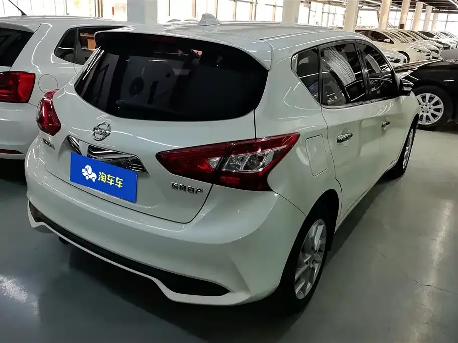 Nissan Tiida — фото 7