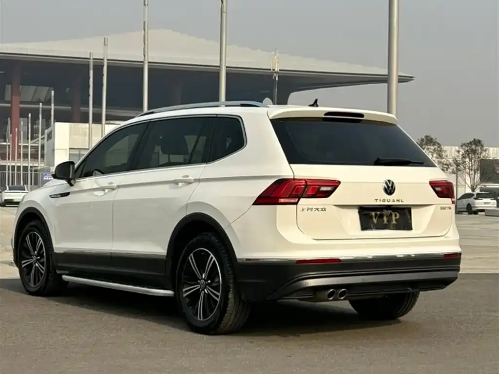 Volkswagen Tiguan L — фото 7