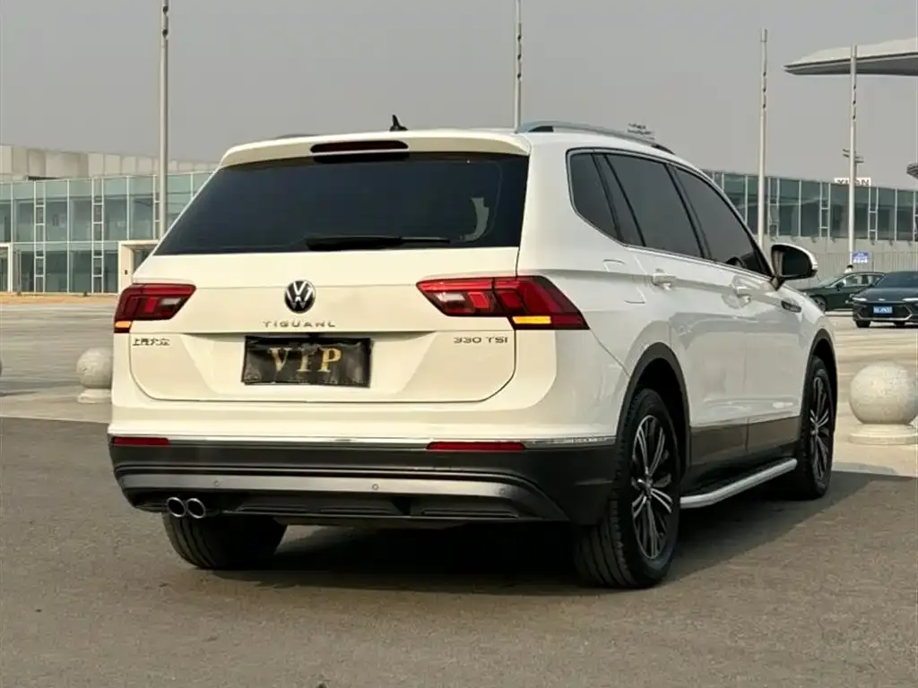 Volkswagen Tiguan L — фото 2