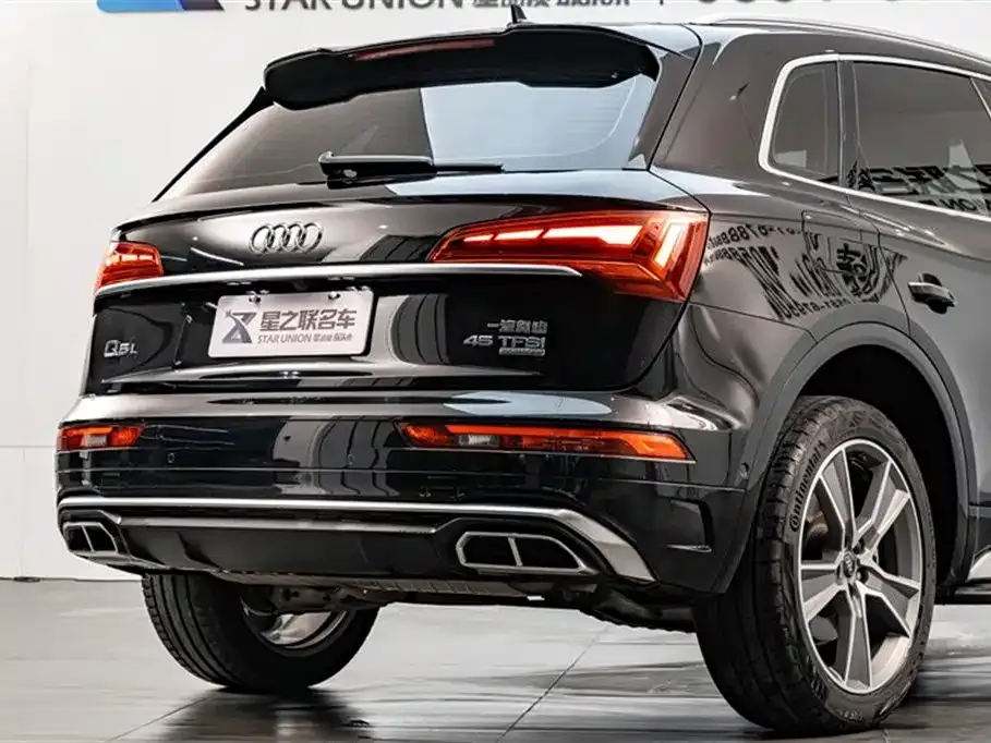Audi Q5L — фото 10