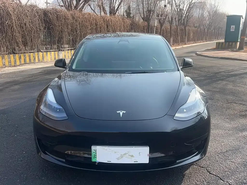 Tesla Model 3 — фото 7