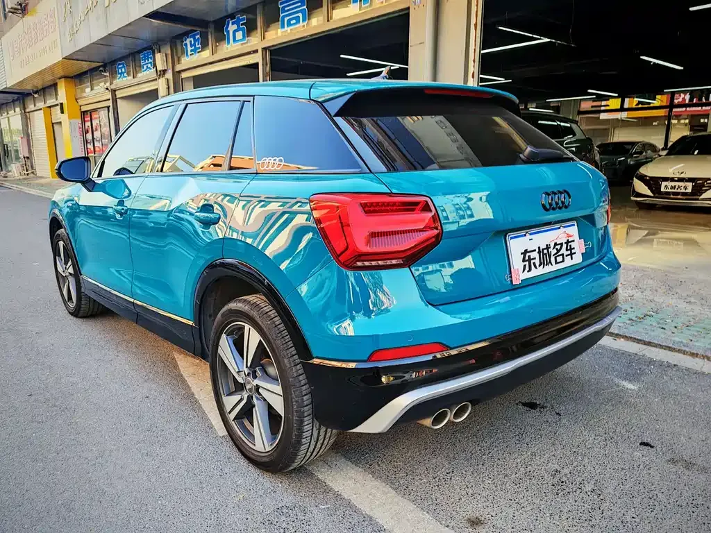 Audi Q2L — фото 10