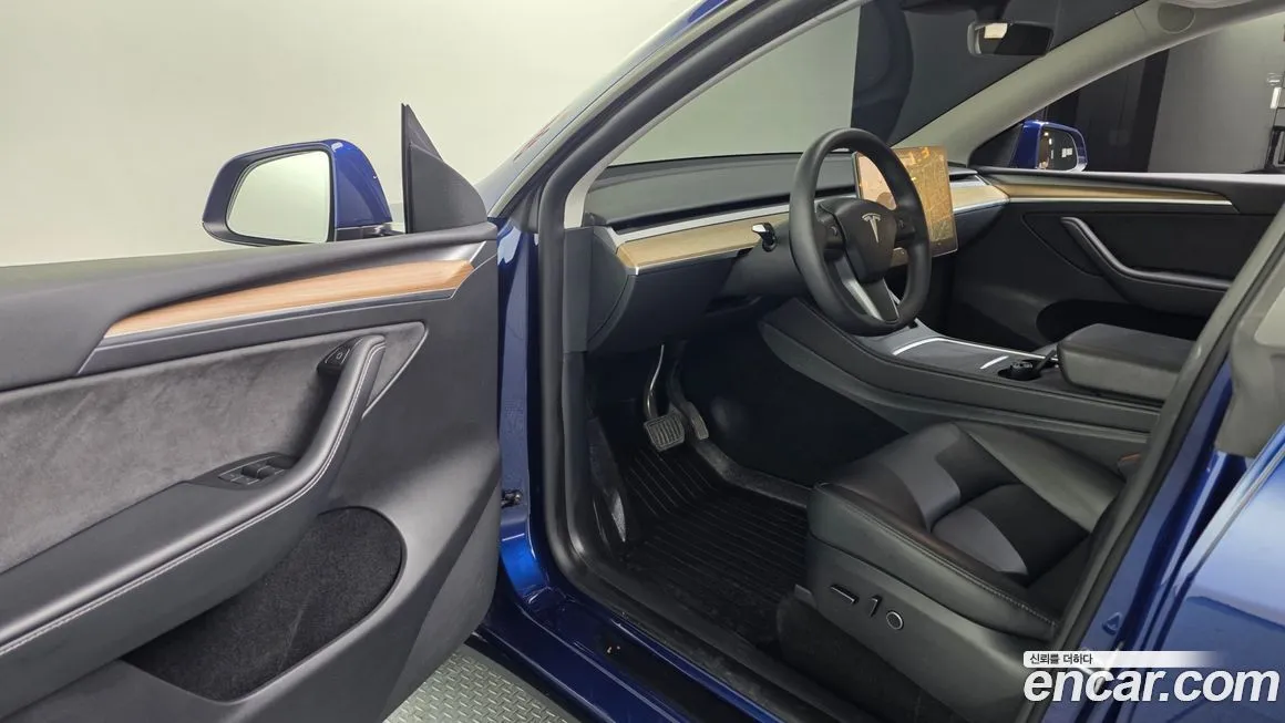 Tesla Model Y — фото 7