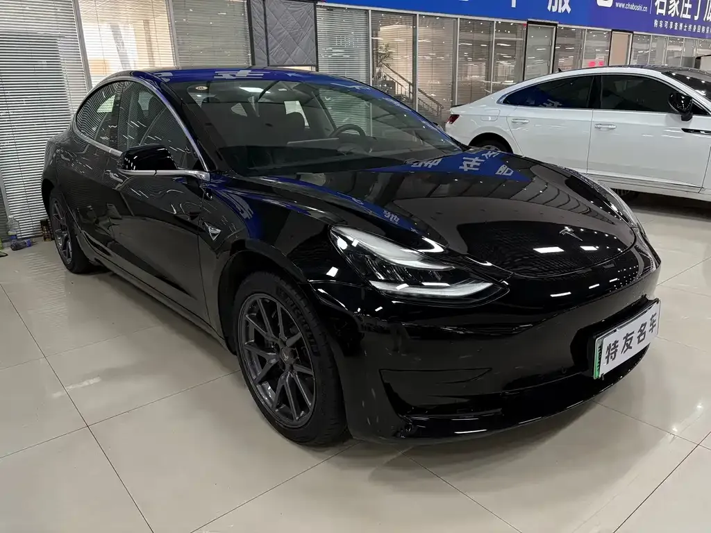 Tesla Model 3 — фото 4