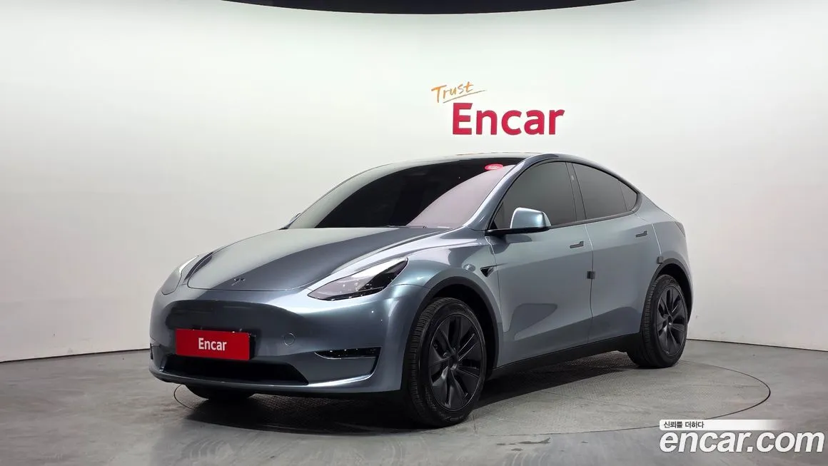 Tesla Model Y — фото 1