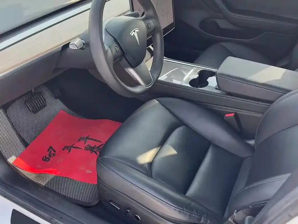 Tesla Model 3 — фото 10