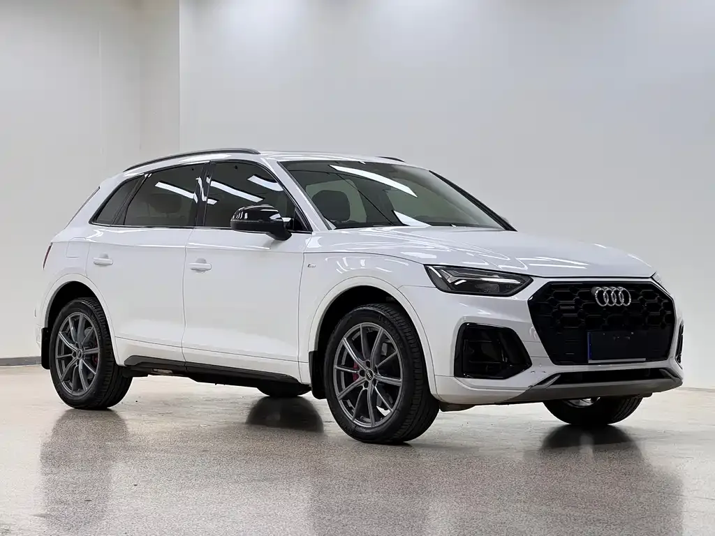 Audi Q5L — фото 5